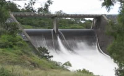 Peter Faust Dam in North Queensland spills for the first time in 20 years after severe drought