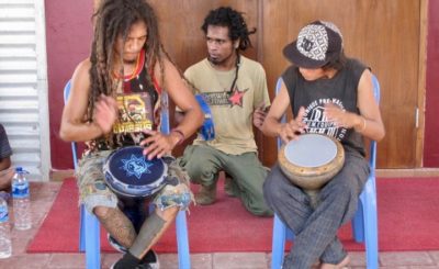Two men are playing drums in Timor-Leste's capital Dili during the Dili City of Peace Marathon