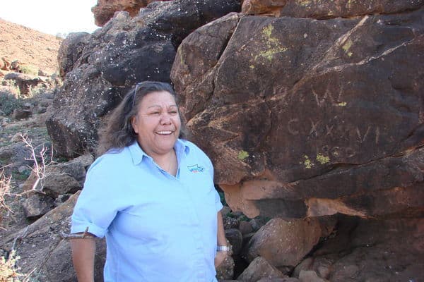 Dot Stephens shows ancient paintings in Burkes Cave, also known as Kukirrka - a highly significant Aboriginal sacred site used by the Barkandji people as a women's birthing cave.