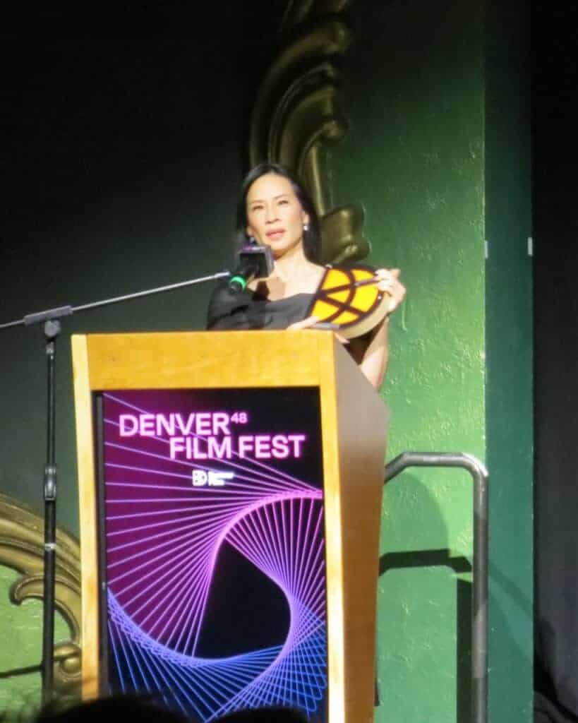 Lucy Liu accepts the John Cassavetes Award at the Denver Film Festival