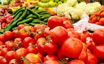 tomatoes and cucumbers at a market - vegetables that authorities warned of after a deadline E.coli outbreak in europe